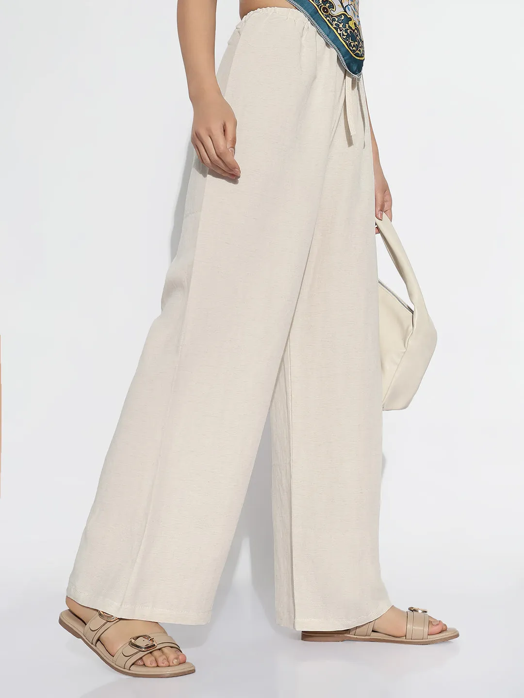 Women Beige Solid Loose Fit Trousers